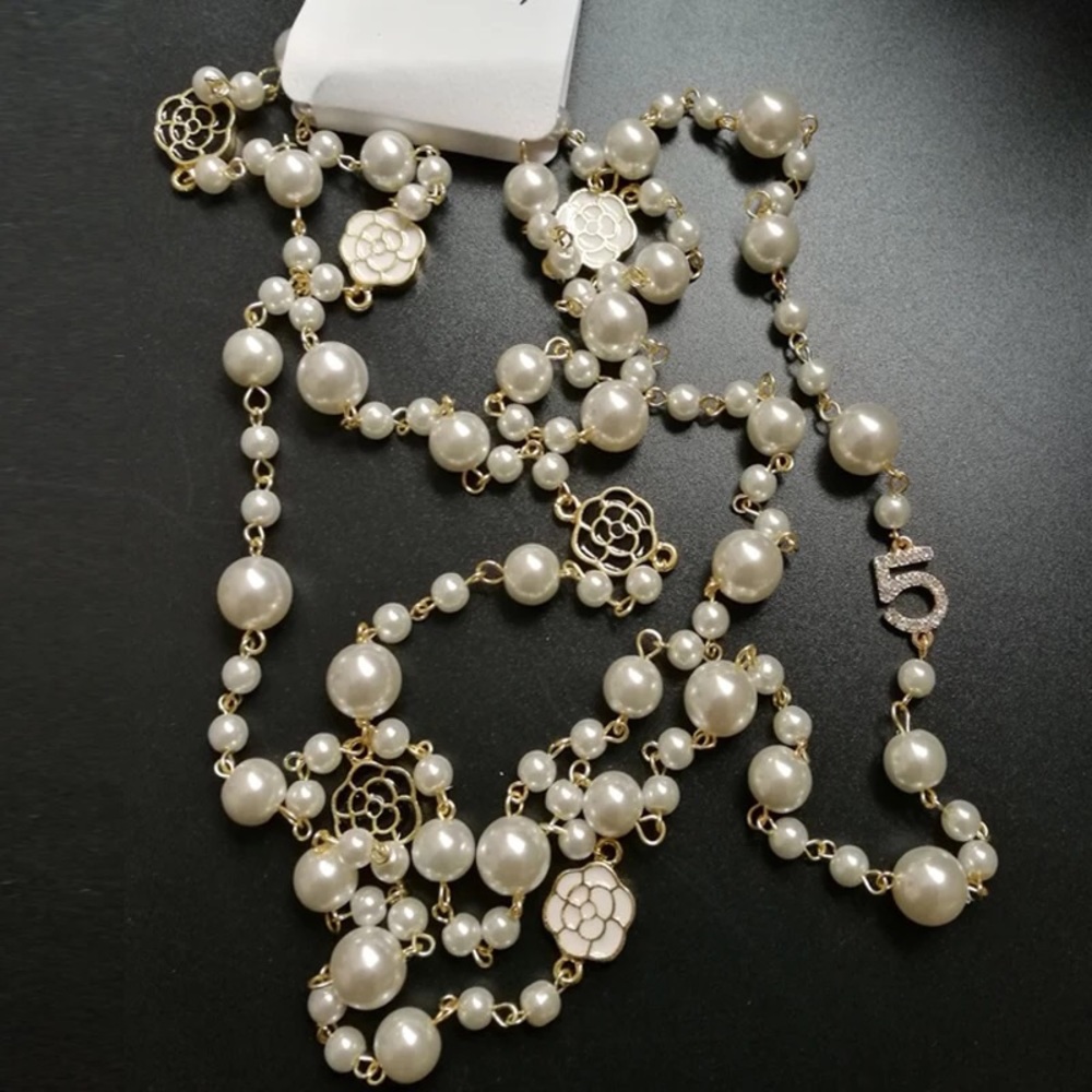 Designer style long pearl necklace